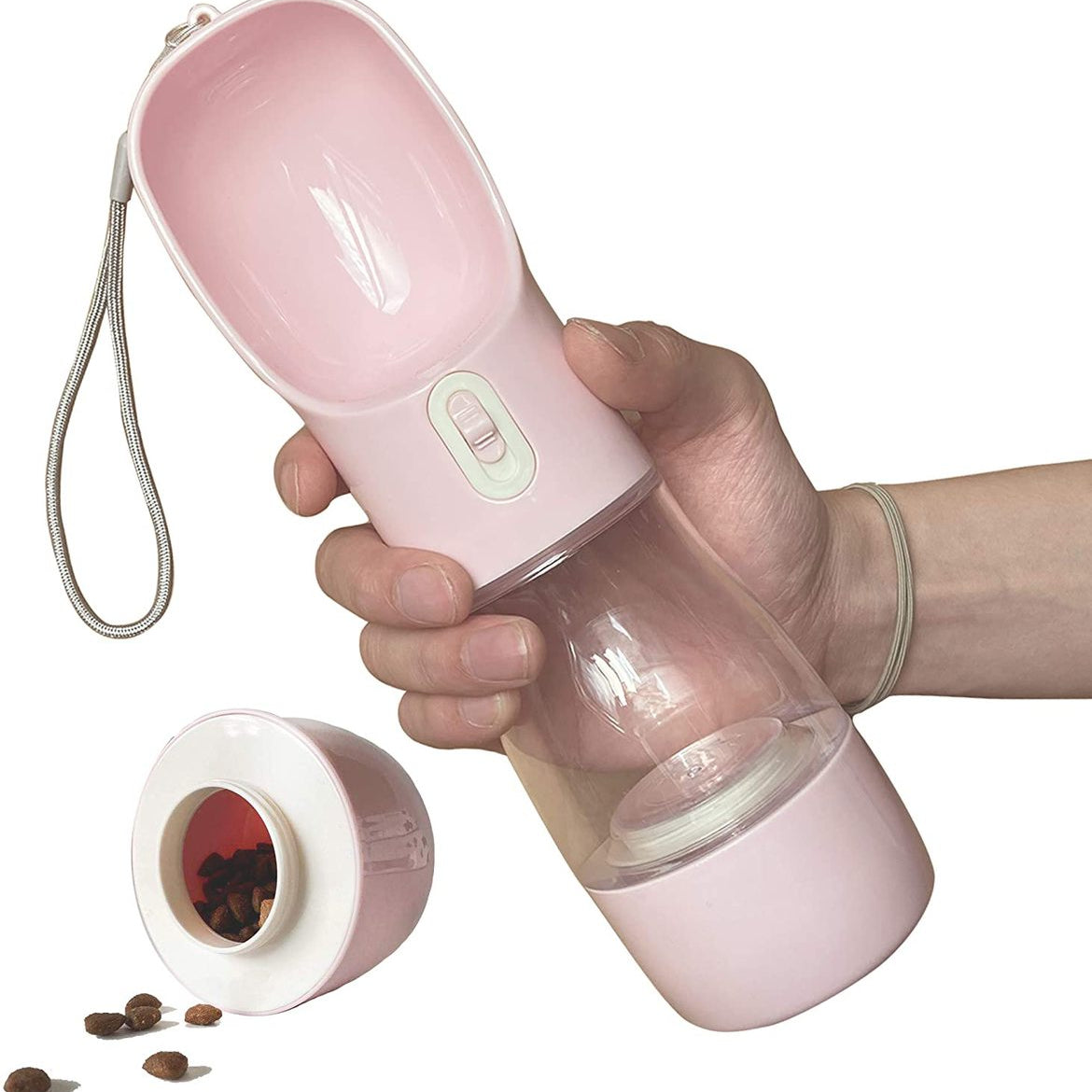 Pink 4 in 1 pet water bottle with built-in bowl and silicone compartment for water or treats.