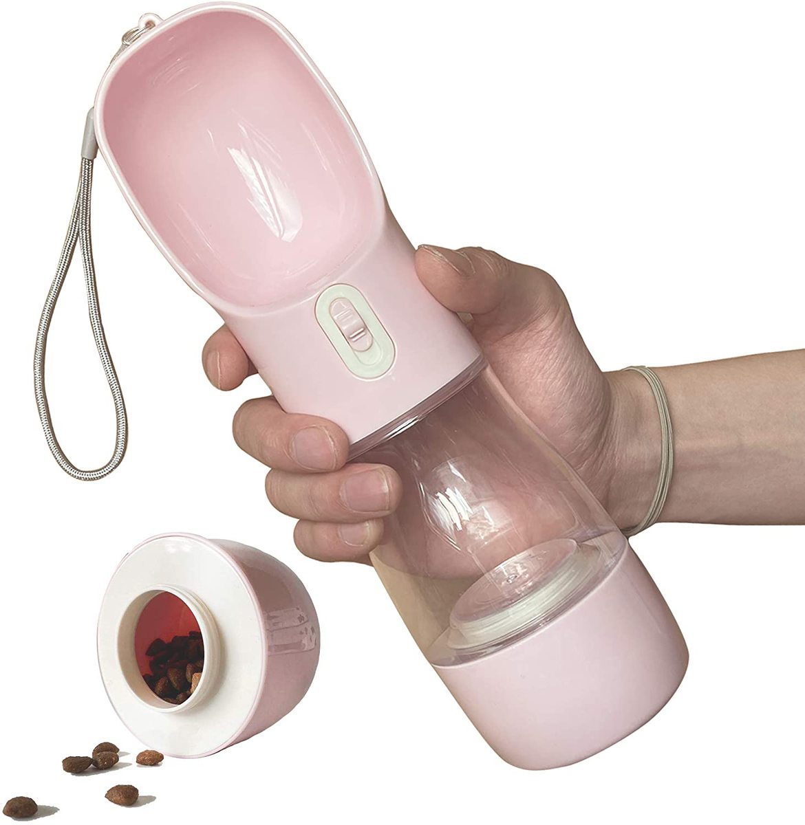 Pink 4 in 1 pet water bottle with built-in bowl and silicone compartment for water or treats.